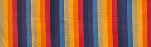 Hand stitched quilt exhibition blog banner.