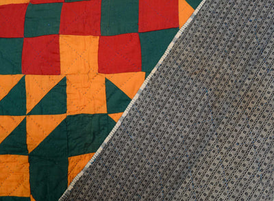 Close up of the backside corner and stitching on 19th century Georgetown Circle Crib Quilt.