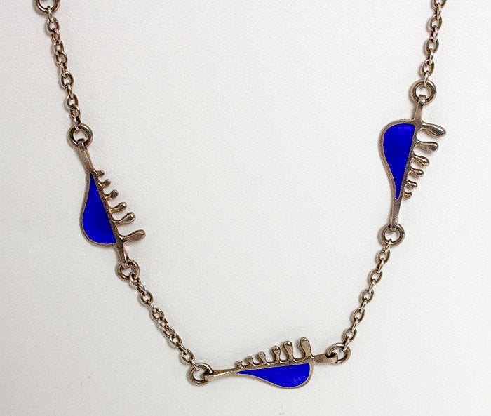 Close up of "Silver And Enamel Modernist Necklace" sold by Stella Rubin Antiques.