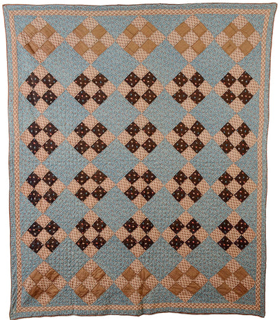 Front of blue and brown Wool Challis Nine Patch Quilt sold by Stella Rubin Antiques.