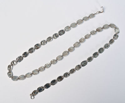 Open clasp top view of Tane Oval Links Silver Necklace.