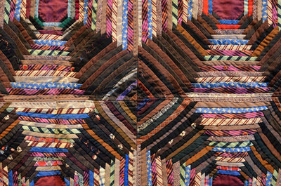Windmill blades quilt pattern close up.