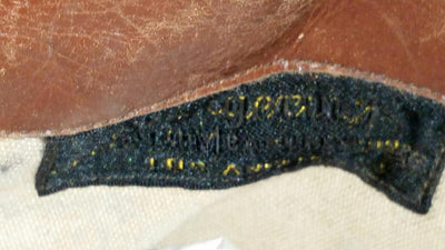 1358679-19th-century-high-button-shoes-display-5-leather-closeup