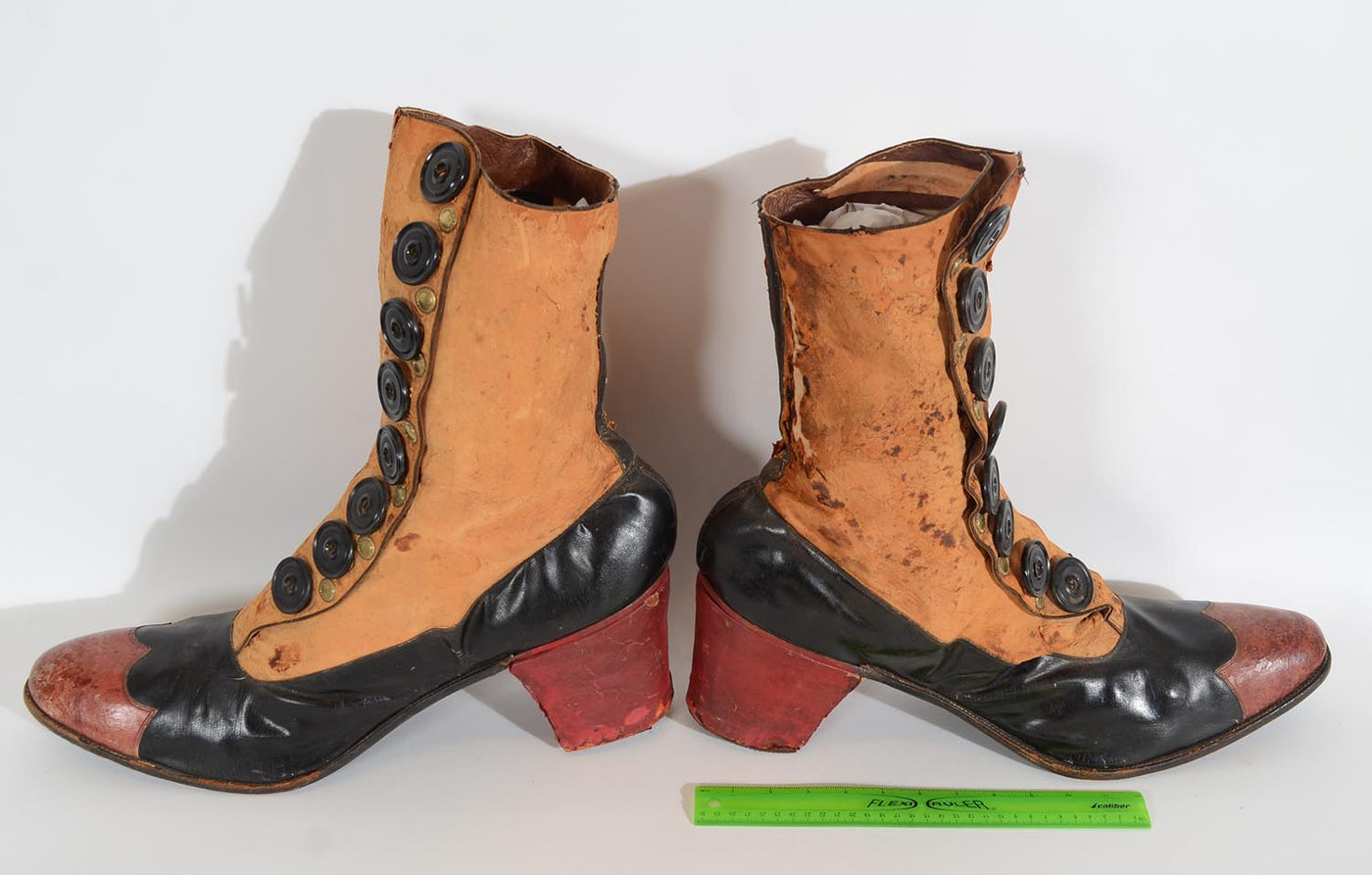 1358679-19th-century-high-button-shoes-display-size-comparison