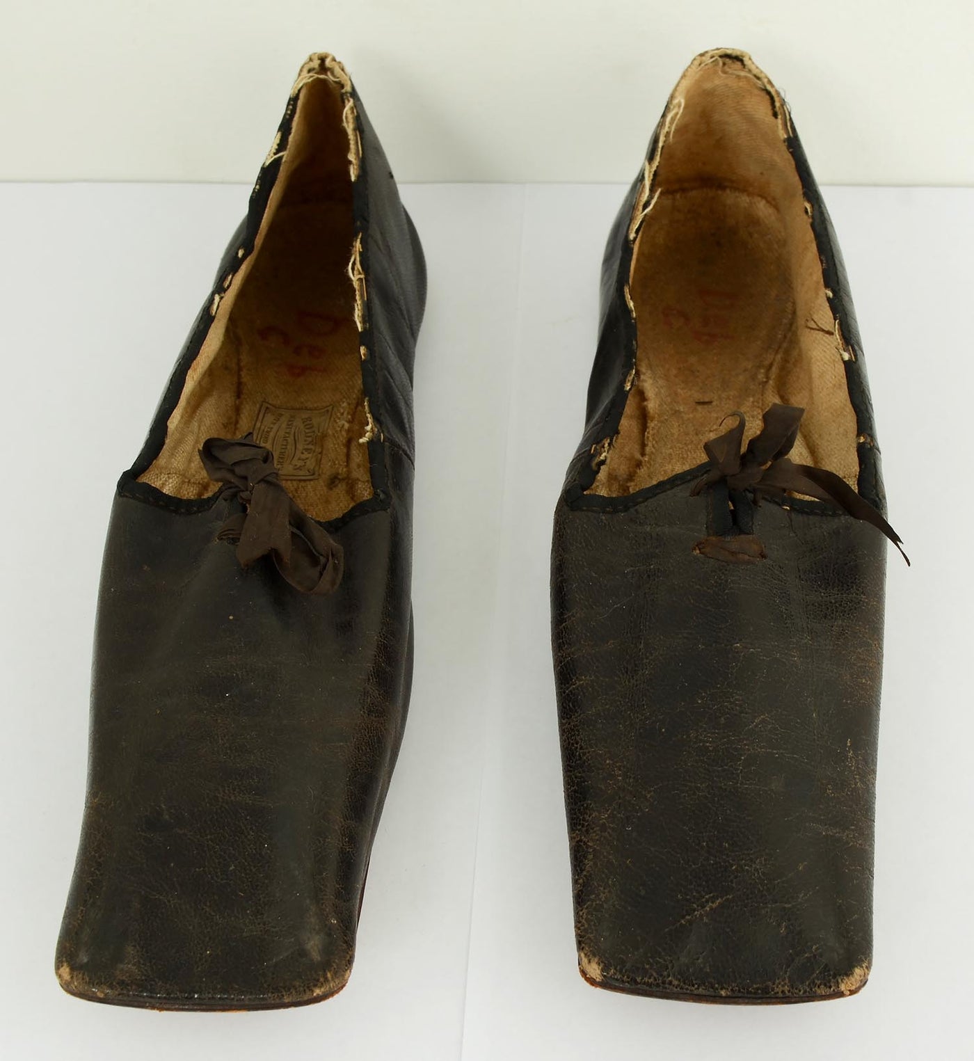 1387392-mid-19th-century-leather-shoes-2-front-view