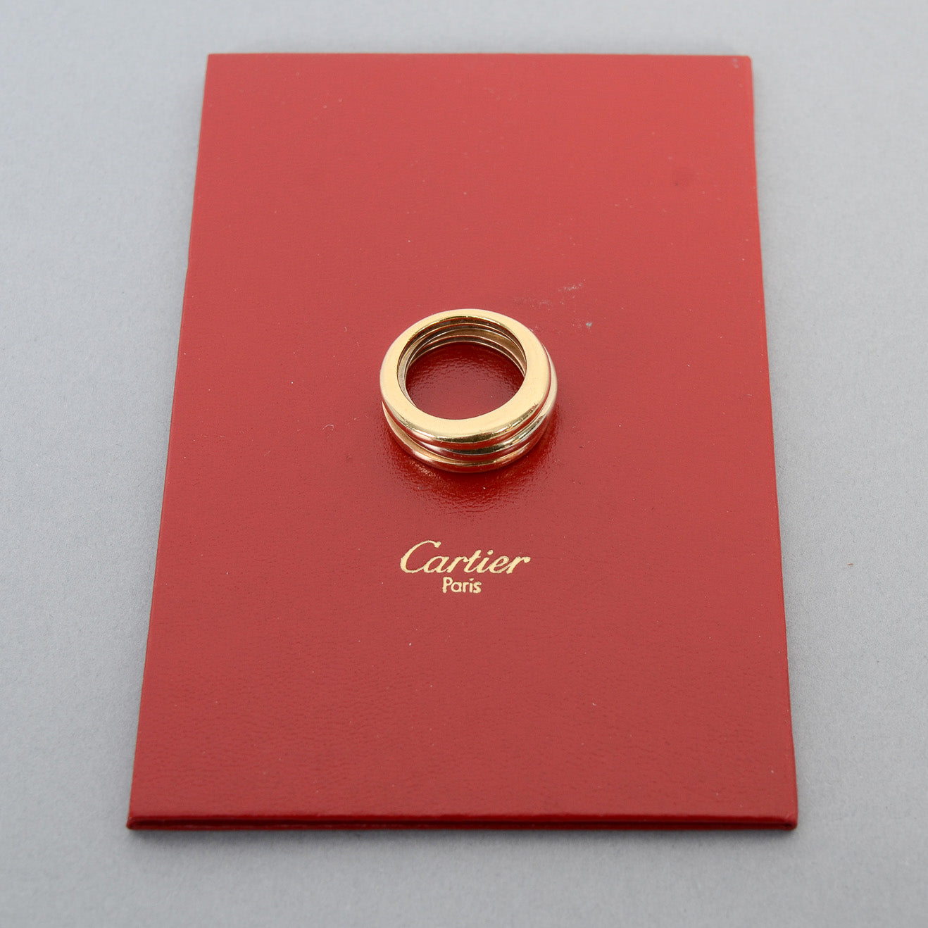 1413892-cartier-paris-ring-on-red-certificate-envelope