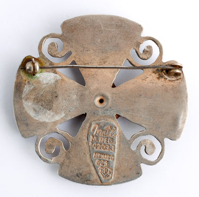 Back view of brooch #1378294 showing artist stamp.
