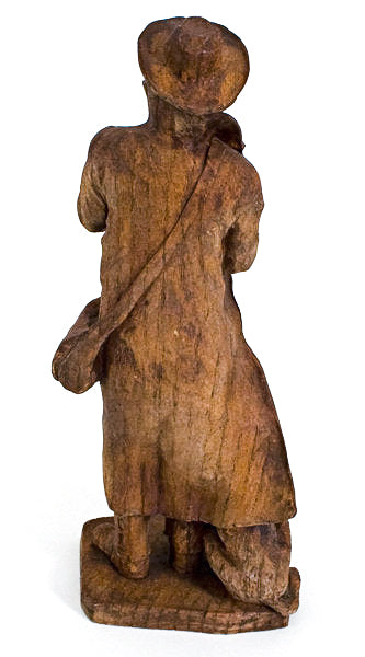 Back view of wood Carving of Frontiersman And His Dog. Item 970433 