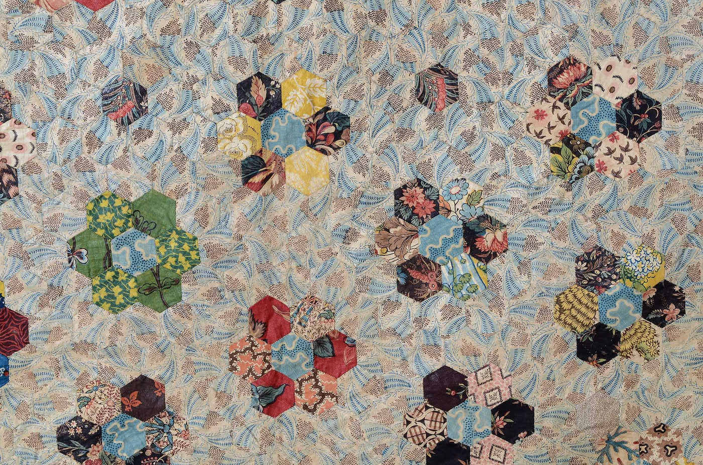 Close-up detailed hexagons patterned patches from antique quilt "Early Mosaic Hexagons Quilt with Center Star: Circa 1820's".
