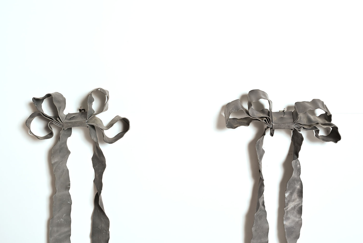 Pair of Lead Bow Ribbons