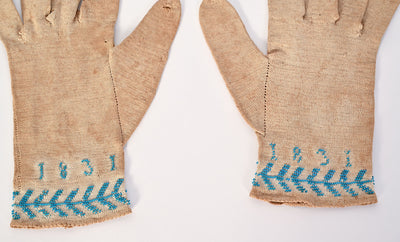 Pair of beaded gloves dated 1831