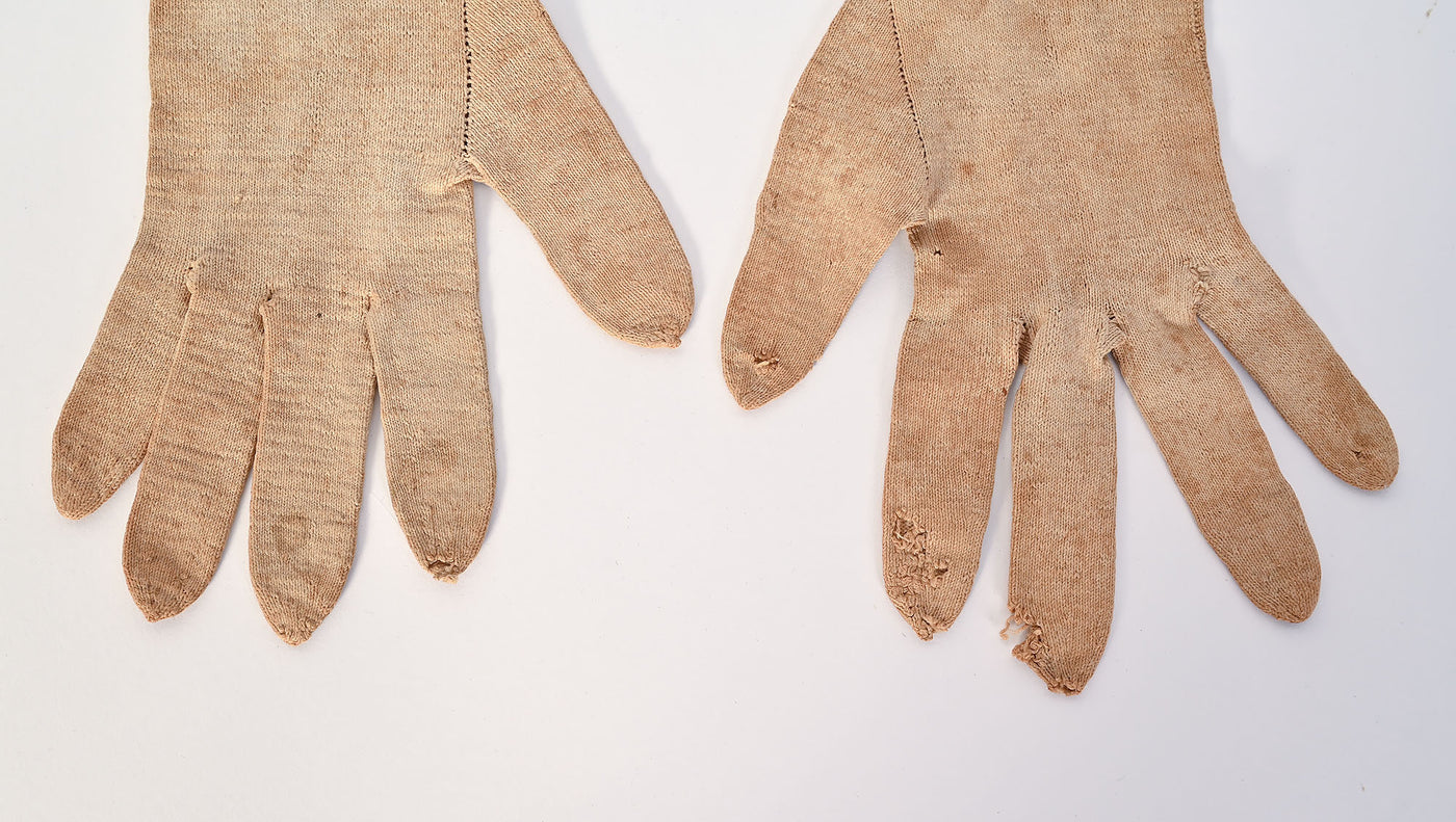 Pair of beaded gloves dated 1831
