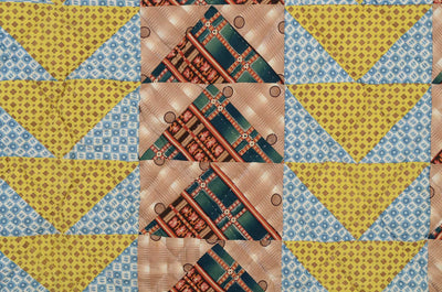 flying-geese-quilt-1372609-stitching-detail-4_4931f745-e221-4245-8a33-d67863ce4e21