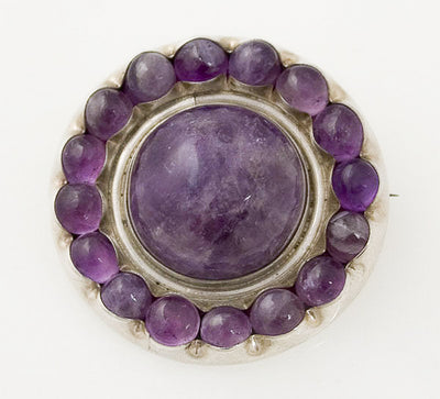 Amethyst and Sterling Silver brooch by Fred Davis and sold by Stella Rubin Antiques. 