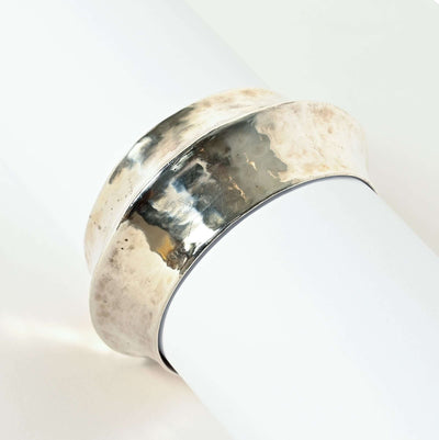 Subtly hammered silver bangle bracelet by Agnes Seebass