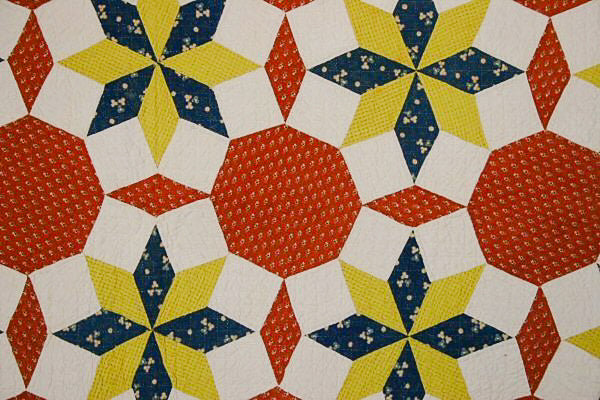 Close up of LeMoyne Stars quilt pattern. 
