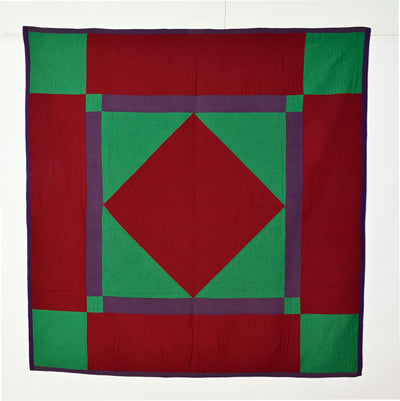 Red, green and purple antique Lancaster County Amish Diamond in Square Quilt from the 1920's.