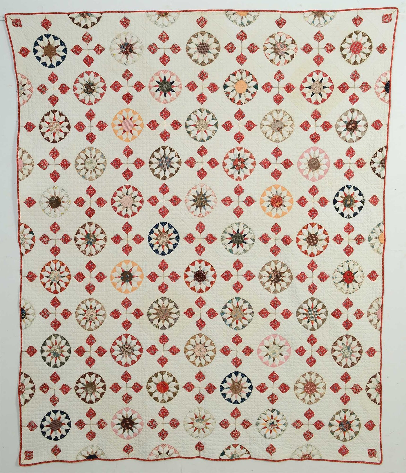 rising-sun-and-hearts-quilt-1453402
