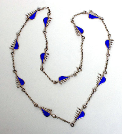 Sterling silver necklace with blue enamel modernist pieces. 