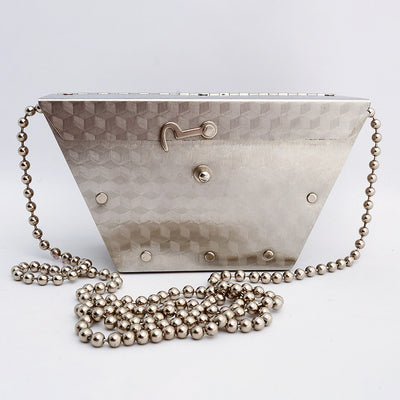 Stainless steel purse by Wendy Stevens with a strap made of steel balls and a hook latch.