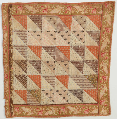 Thousand Pyramids Doll Quilt from the 19th century.